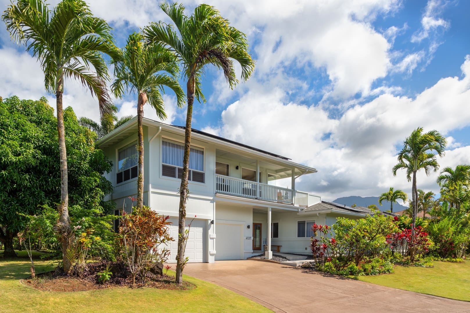 Princeville Vacation Rentals, Hihimanu House - Beautiful exterior shot showcasing the property and lush landscaping.