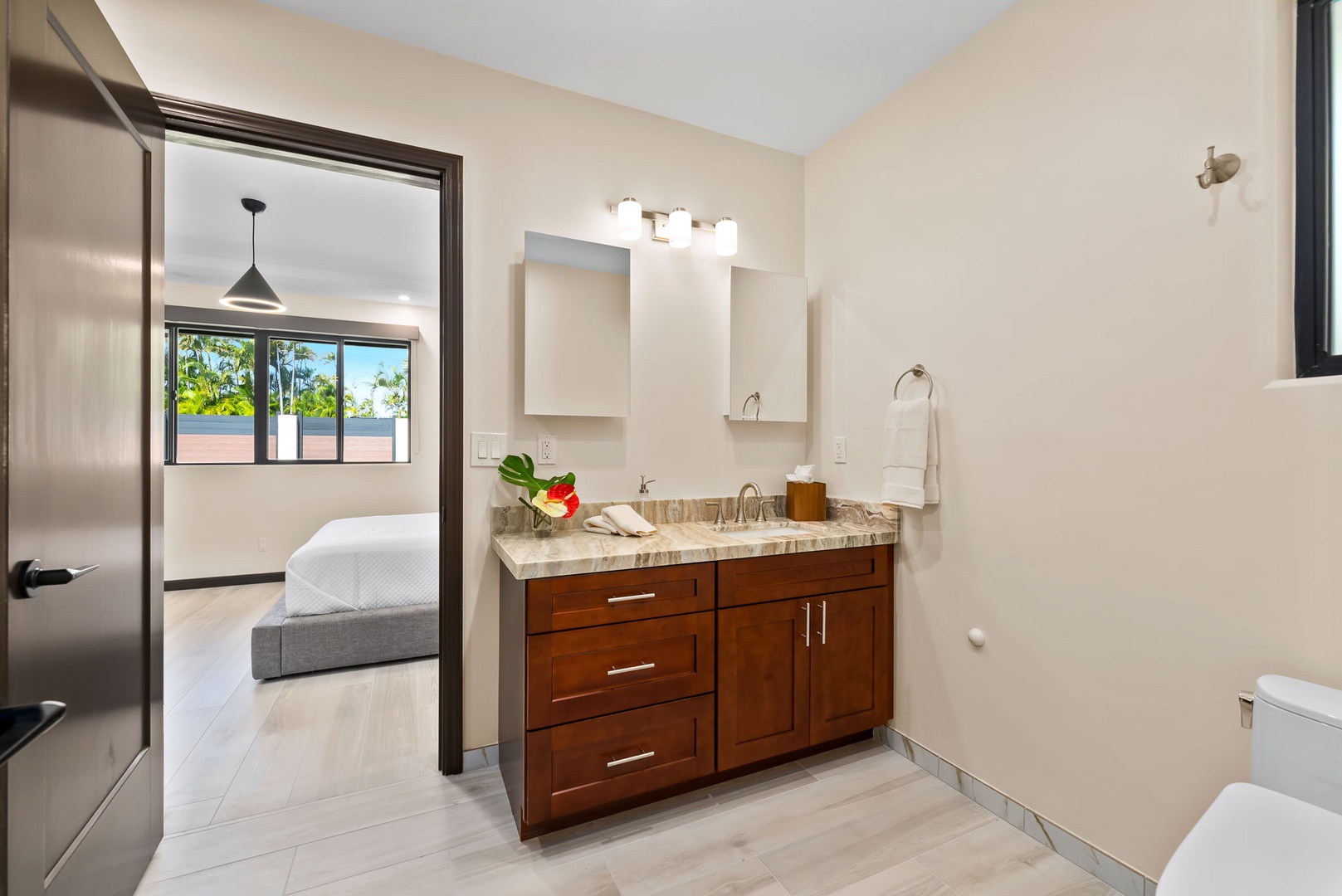 Honolulu Vacation Rentals, Kahala Zen - Well-appointed bathroom featuring a shower and ample counter space.