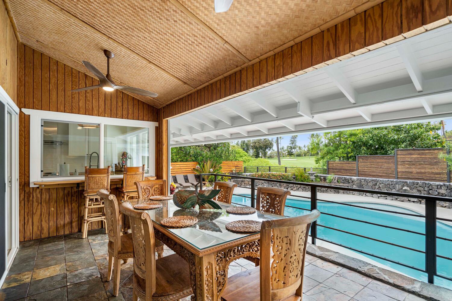 Kailua Kona Vacation Rentals, Manukai Hale - Dine al fresco on the lanai with pool view.