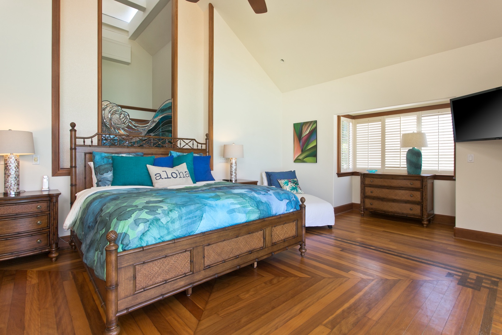 Kailua Vacation Rentals, Hale Melia* - Primary bedroom with a plush king bed.