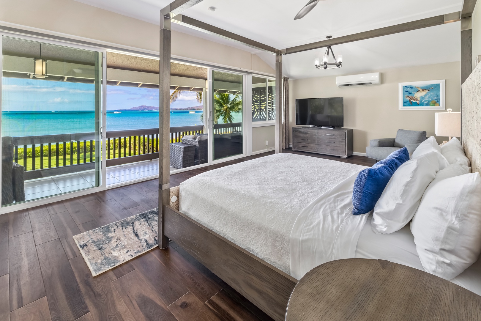 Honolulu Vacation Rentals, Nanea Kai Villa - Elegant primary suite with ocean views and direct lanai access for a relaxing retreat.