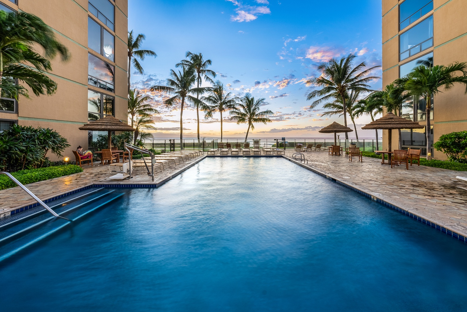 Lahaina Vacation Rentals, Mahana 1119 - Dive into tropical bliss at Mahana 1119 pool with ocean views and swaying palm trees.