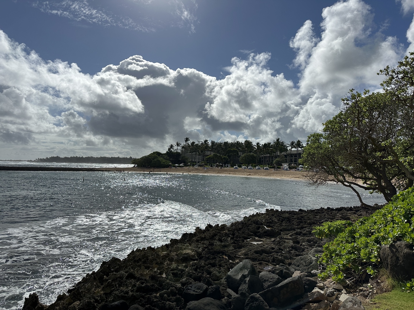 Kahuku Vacation Rentals, Kuilima Estates West #132 - Rocky coastline with bright clouds and calm water.