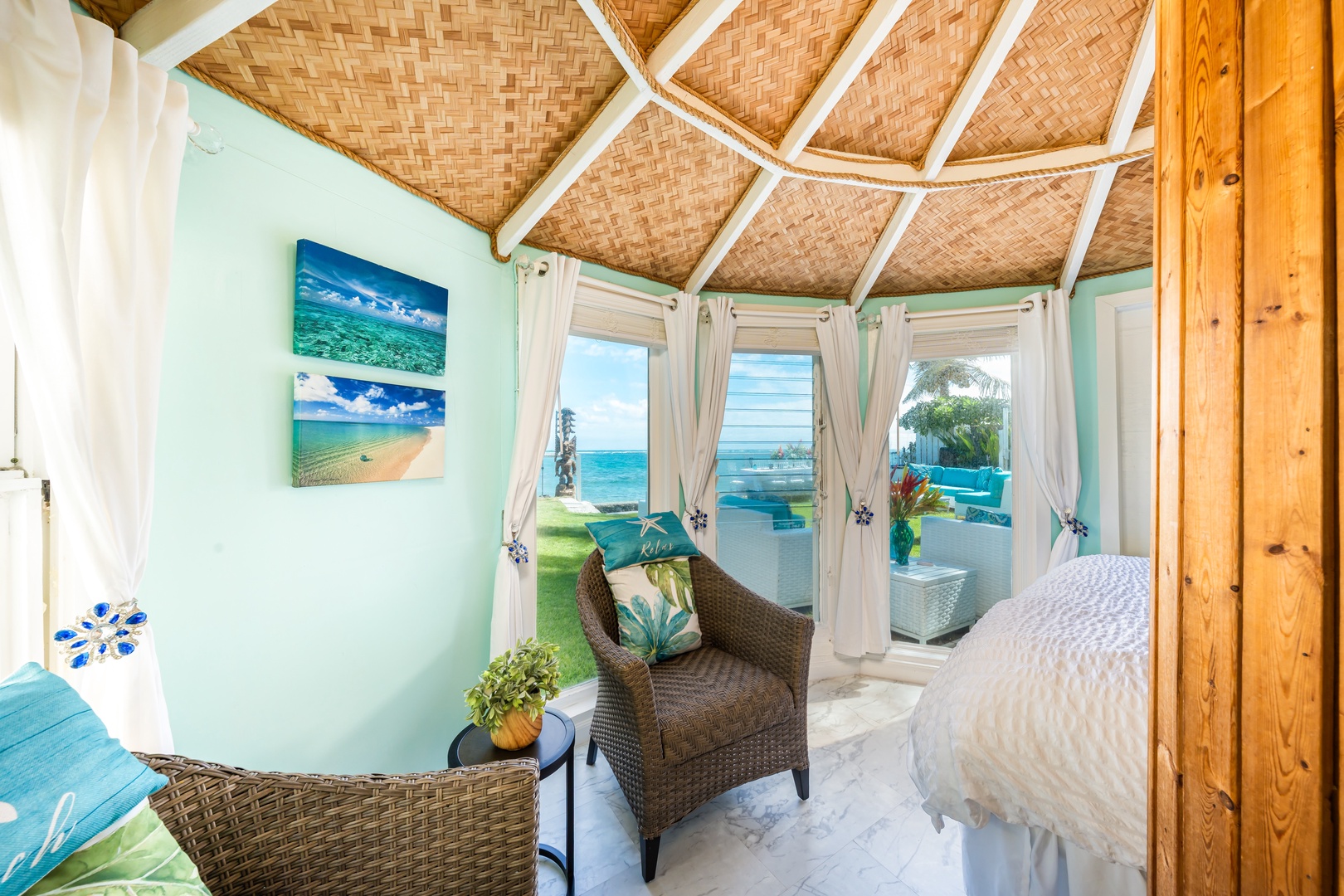 Hauula Vacation Rentals, Private Beach Paradise - Windows wrap the room, so the view is the first thing you see each morning.