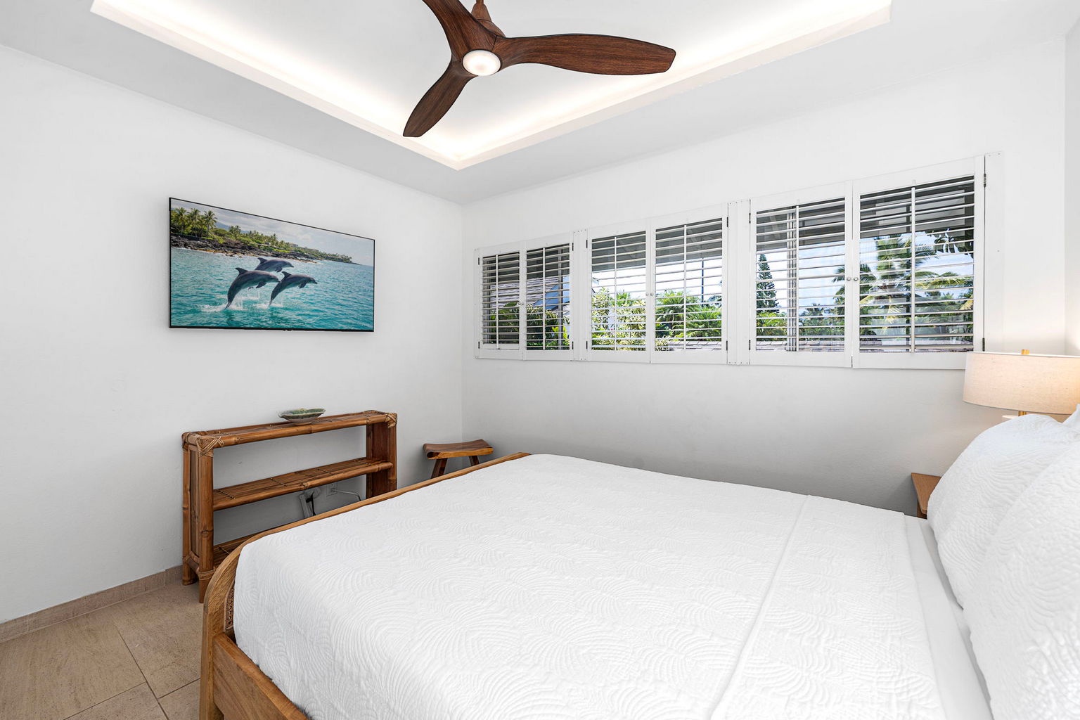 Kailua Kona Vacation Rentals, Manukai Hale - This guest room keeps it simple: a soft bed, Boho styling, and afternoon light.