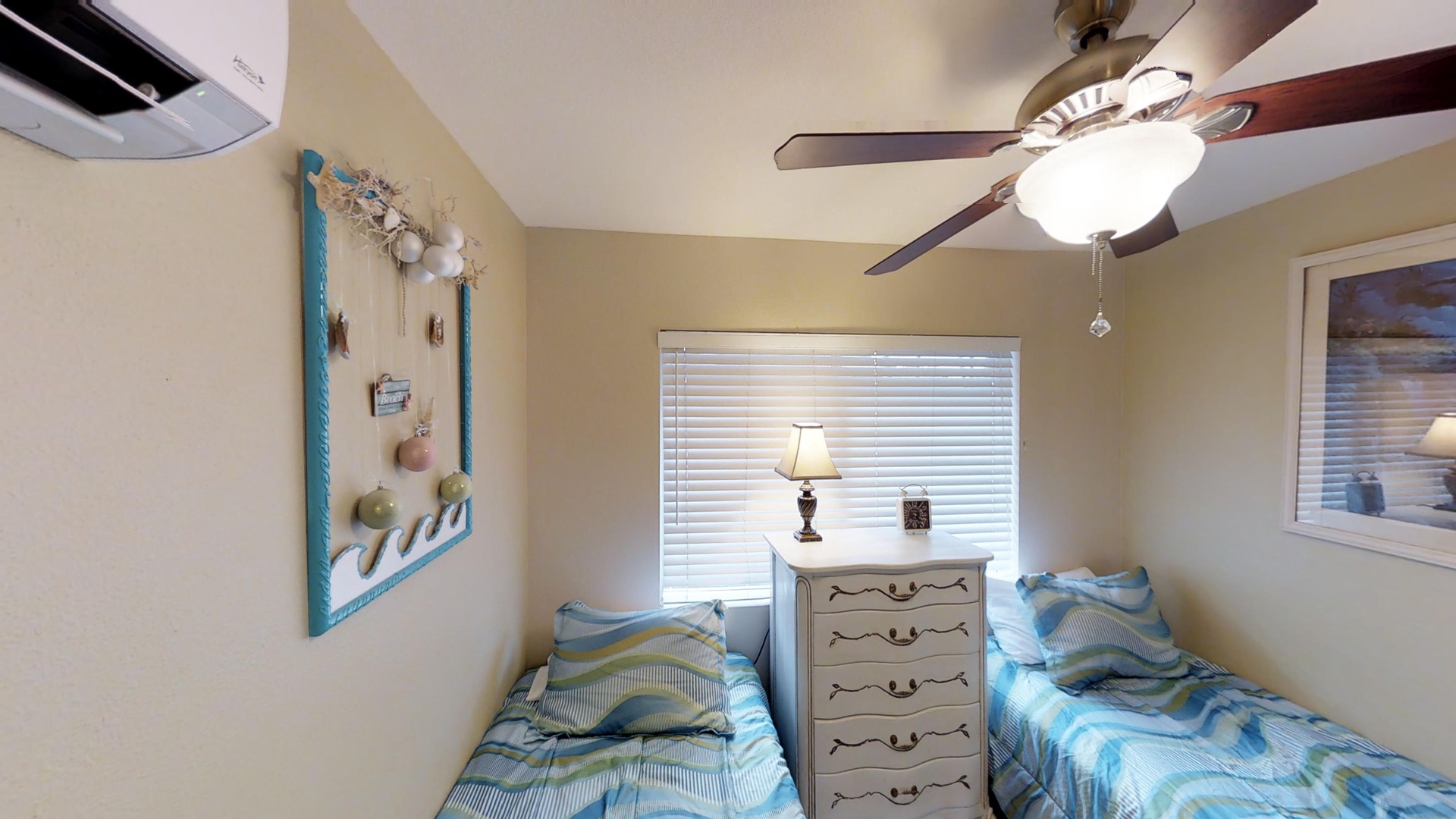Kapolei Vacation Rentals, Fairways at Ko Olina 8G - The third guest bedroom has twin beds and a tall dresser with antique pearl detail.