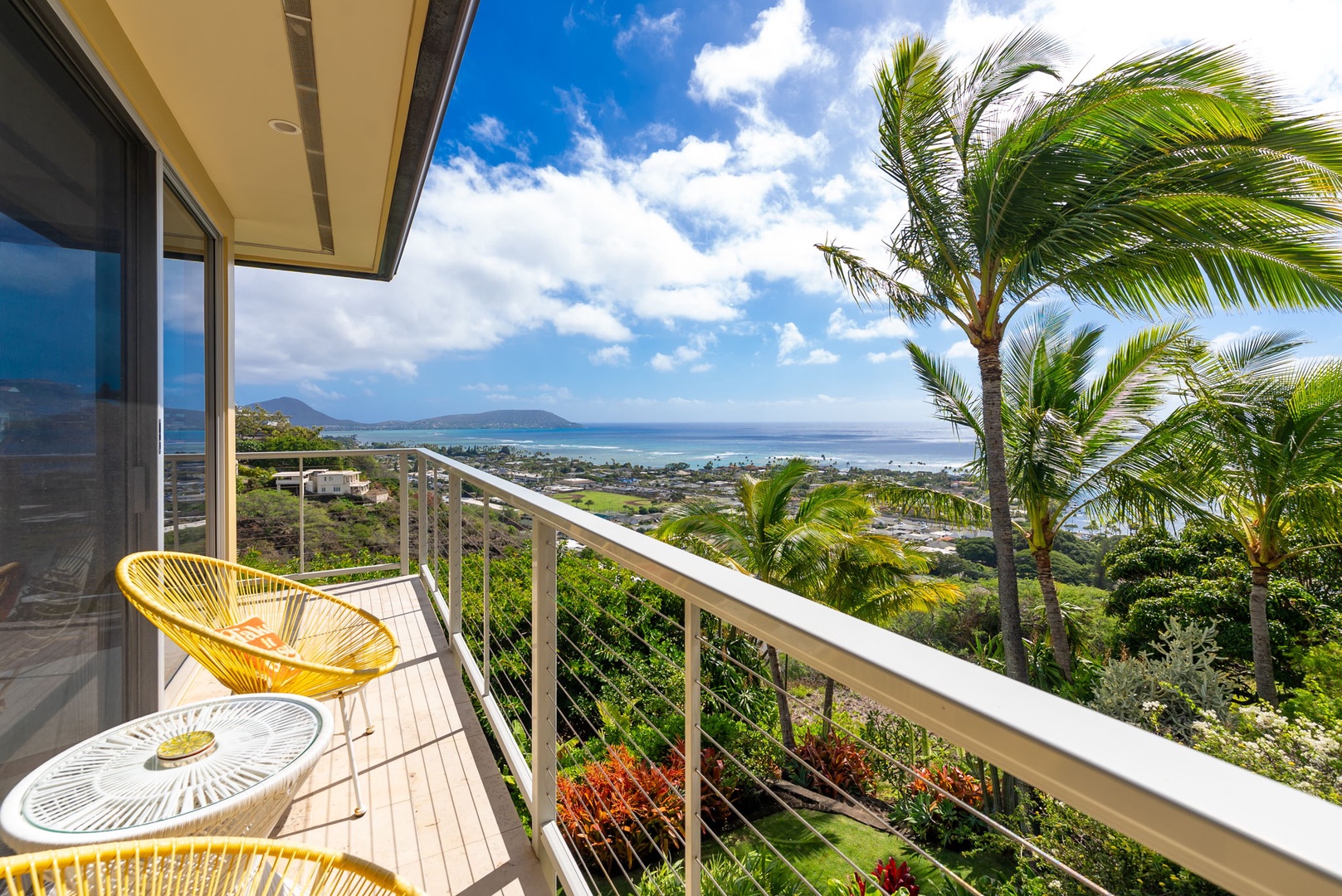 Honolulu Vacation Rentals, Kahala Hills Estate - Spectacular Pacific views from the upper lanai capture the beauty of Honolulu’s coastline.
