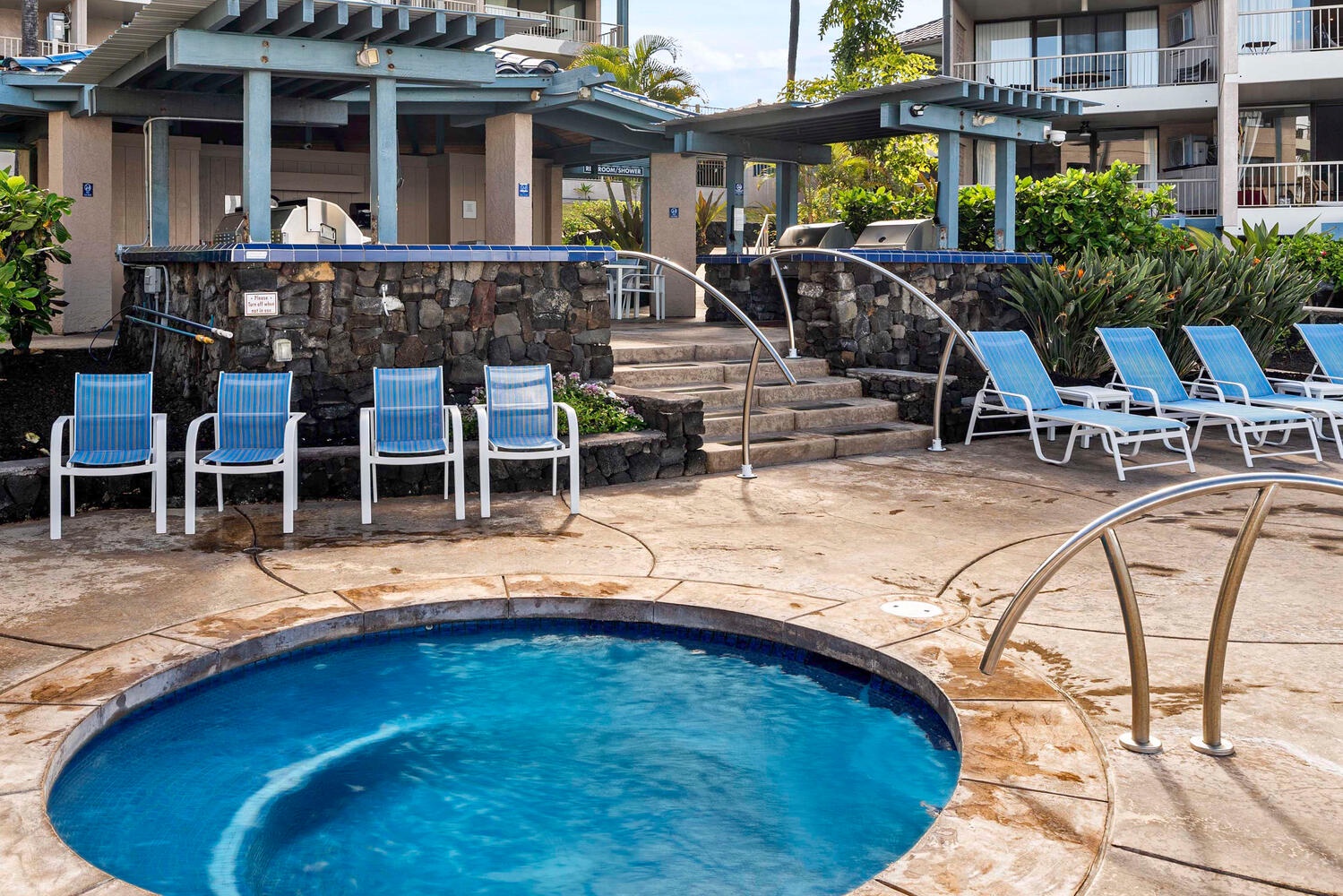 Kailua-Kona Vacation Rentals, Kona Reef B32 - Relax by the spa pool with sun loungers.