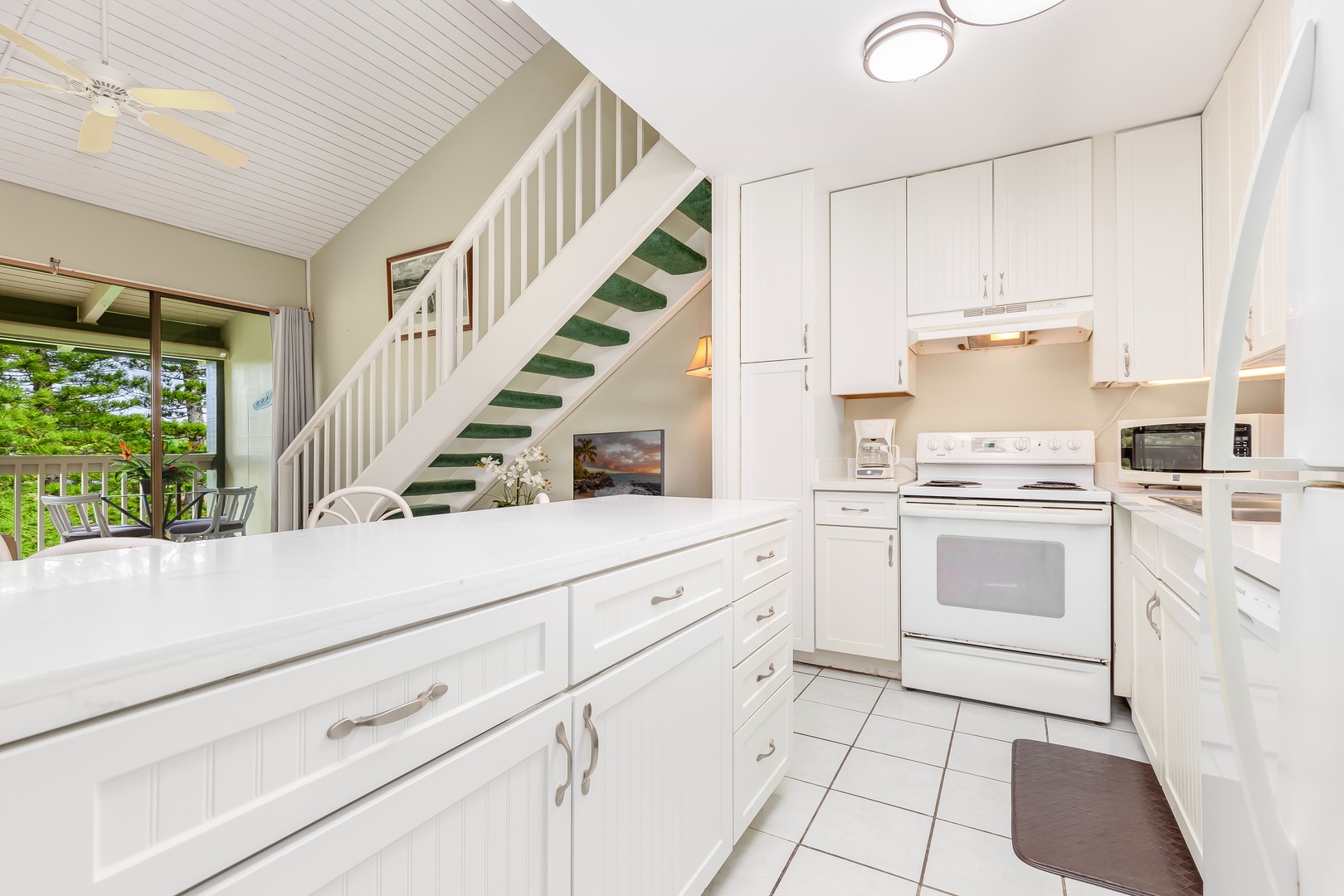 Kahuku Vacation Rentals, Ilima West Kuilima Estates #18 at Turtle Bay - A generously sized kitchen island at its heart, our home is ready to cater to all your entertainment needs.