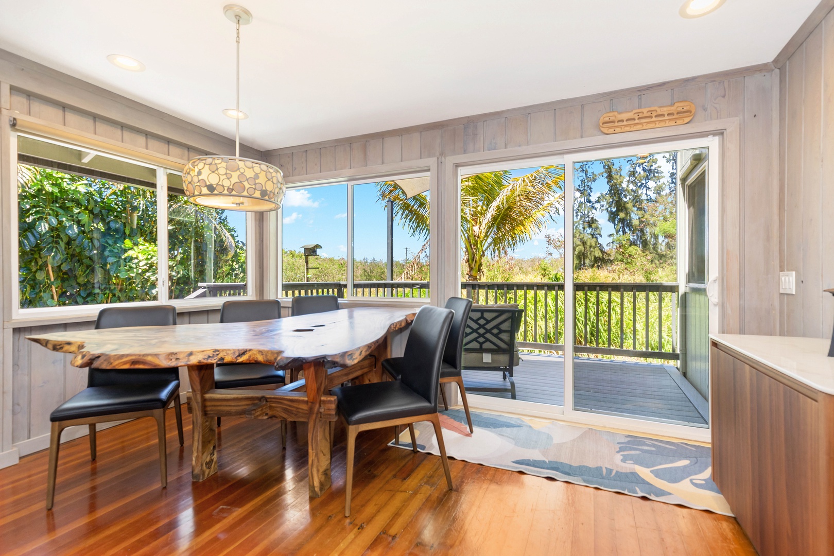 Haleiwa Vacation Rentals, Velzey Ohana Villa (4B Vacation Home) - Gather around the dining table with wraparound views and ocean breezes through the windows.