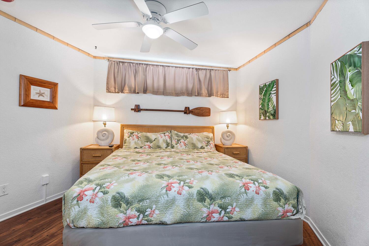 Kailua-Kona Vacation Rentals, Kona Reef B32 - Relax in the bedroom with tropical decor after a day of exploration.