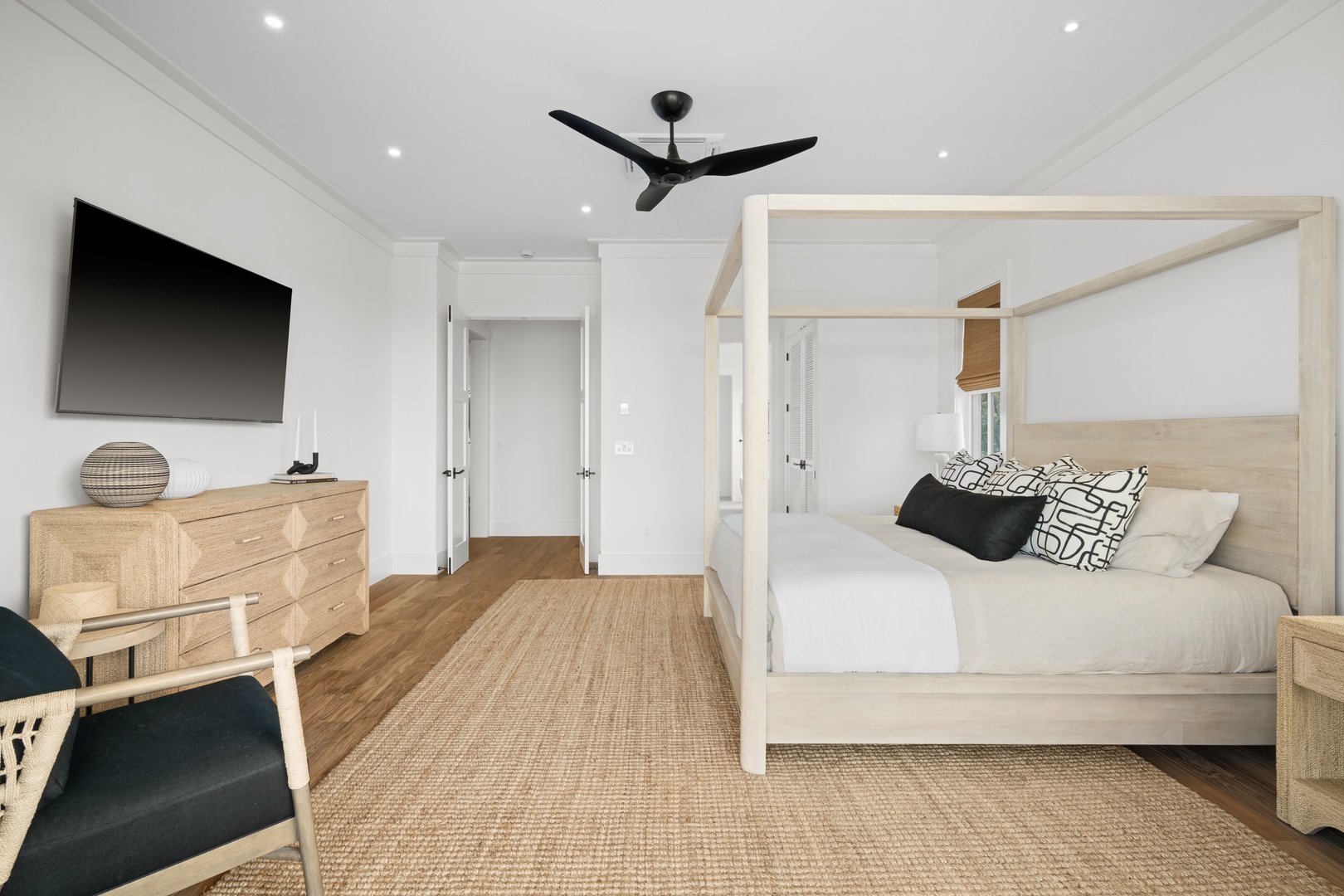 Koloa Vacation Rentals, Makani Kai - This bedroom keeps its own wall TV and dresser, bright and uncluttered.