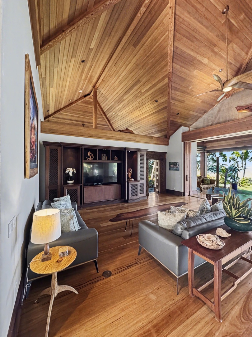 Kailua-Kona Vacation Rentals, Hahalua Bay Villa - Relax in your stunning vaulted living room where warm wood beams soar overhead and tropical breezes flow through open spaces to paradise.