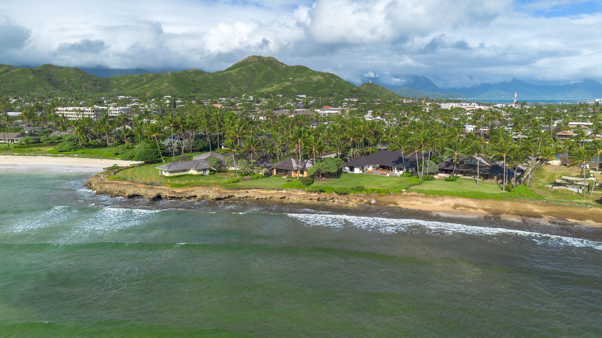 Kailua Vacation Rentals, Castle Point Estate - Aerial shoreline perspective showing the estate’s commanding oceanfront position.