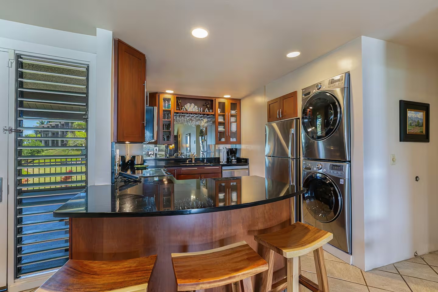 Princeville Vacation Rentals, Hanalei Bay Resort 4302 - Conveniently prep meals in the fully-equipped kitchen with bar seating for three.