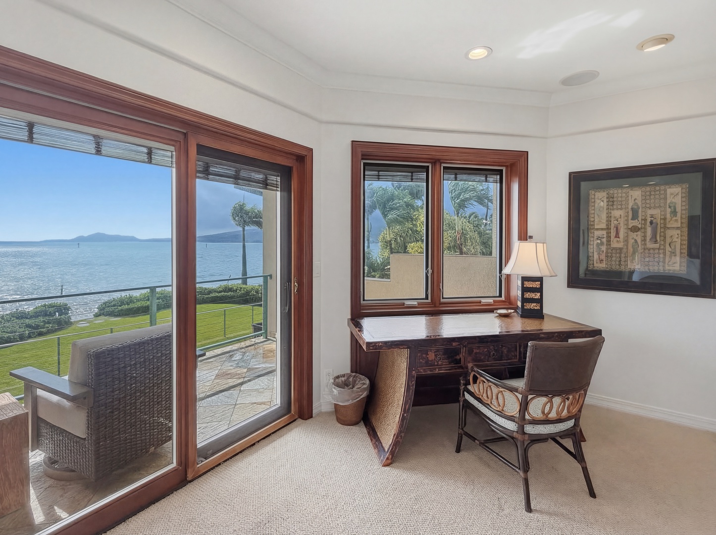 Honolulu Vacation Rentals, Maunalua Estate - Your personal workspace overlooks stunning ocean views, where morning coffee meets endless blue horizons through elegant wood-framed windows.