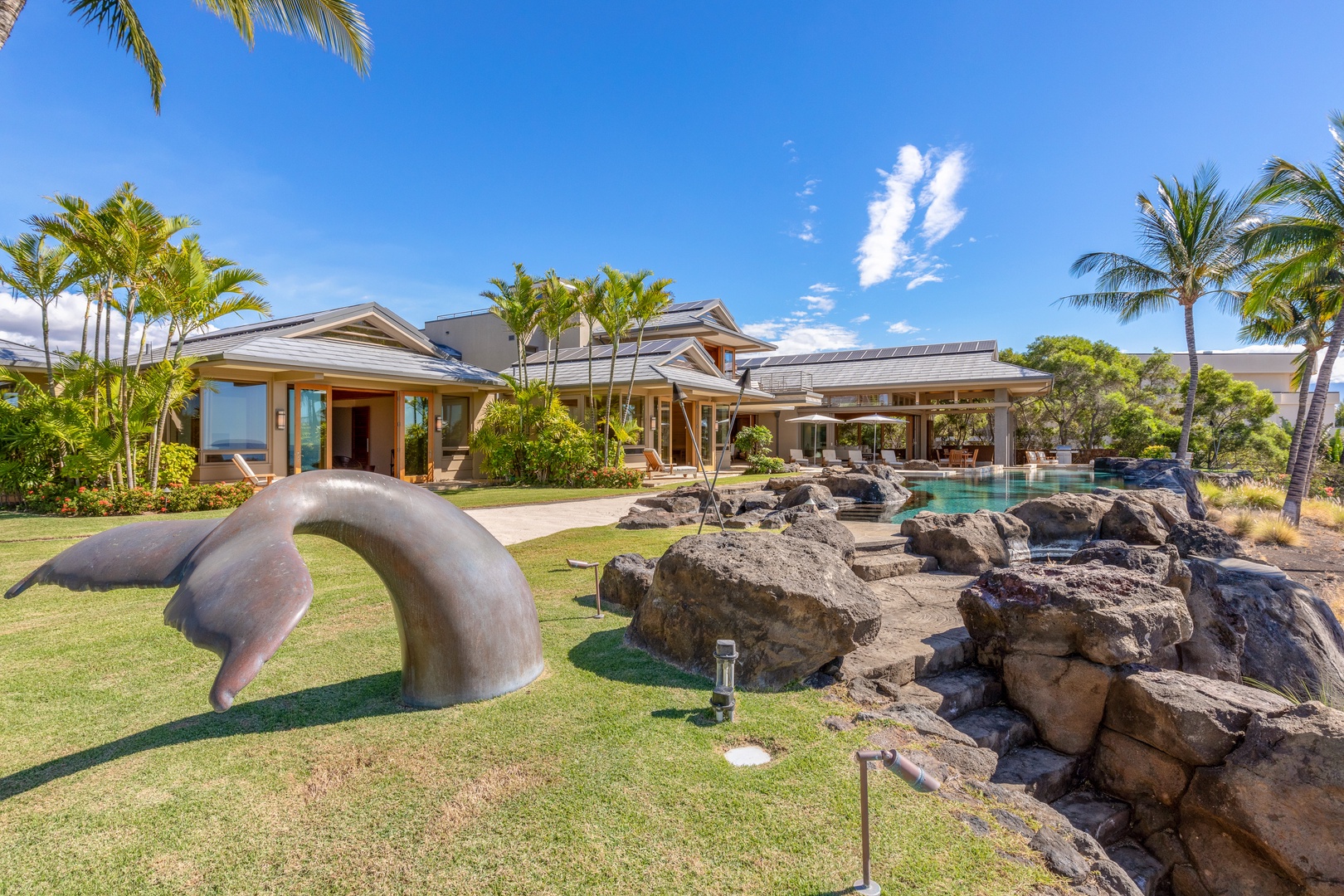 Kamuela Vacation Rentals, Mauna Kea Resort Bluffs 22 - The Beach House - The whale tail says it all: hang loose, soak it in, and take it slow.
