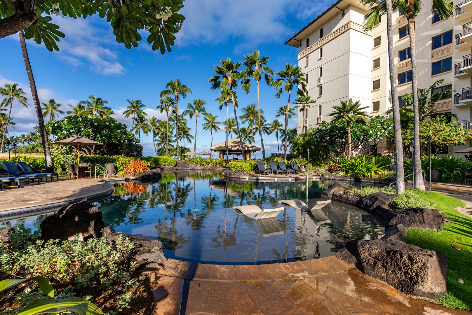 Kapolei Vacation Rentals, Ko Olina Beach Villas B109 - Rock-lined ponds thread the grounds, quiet water between the towers.