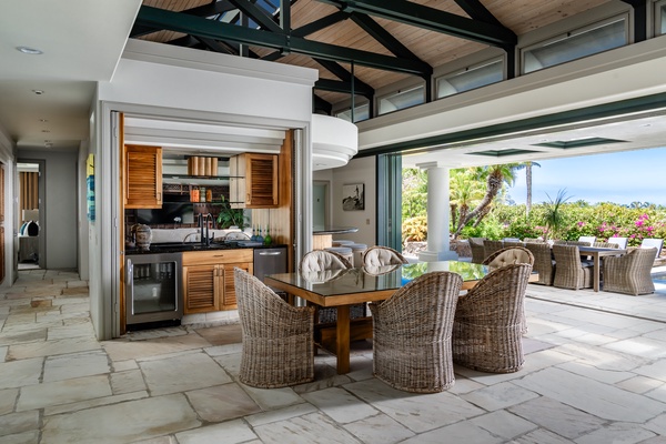 Kamuela Vacation Rentals, Canoe House & Beach Walker at Champion Ridge - Open dining area with comfortable seating, conveniently connected to the kitchen and outdoor space.