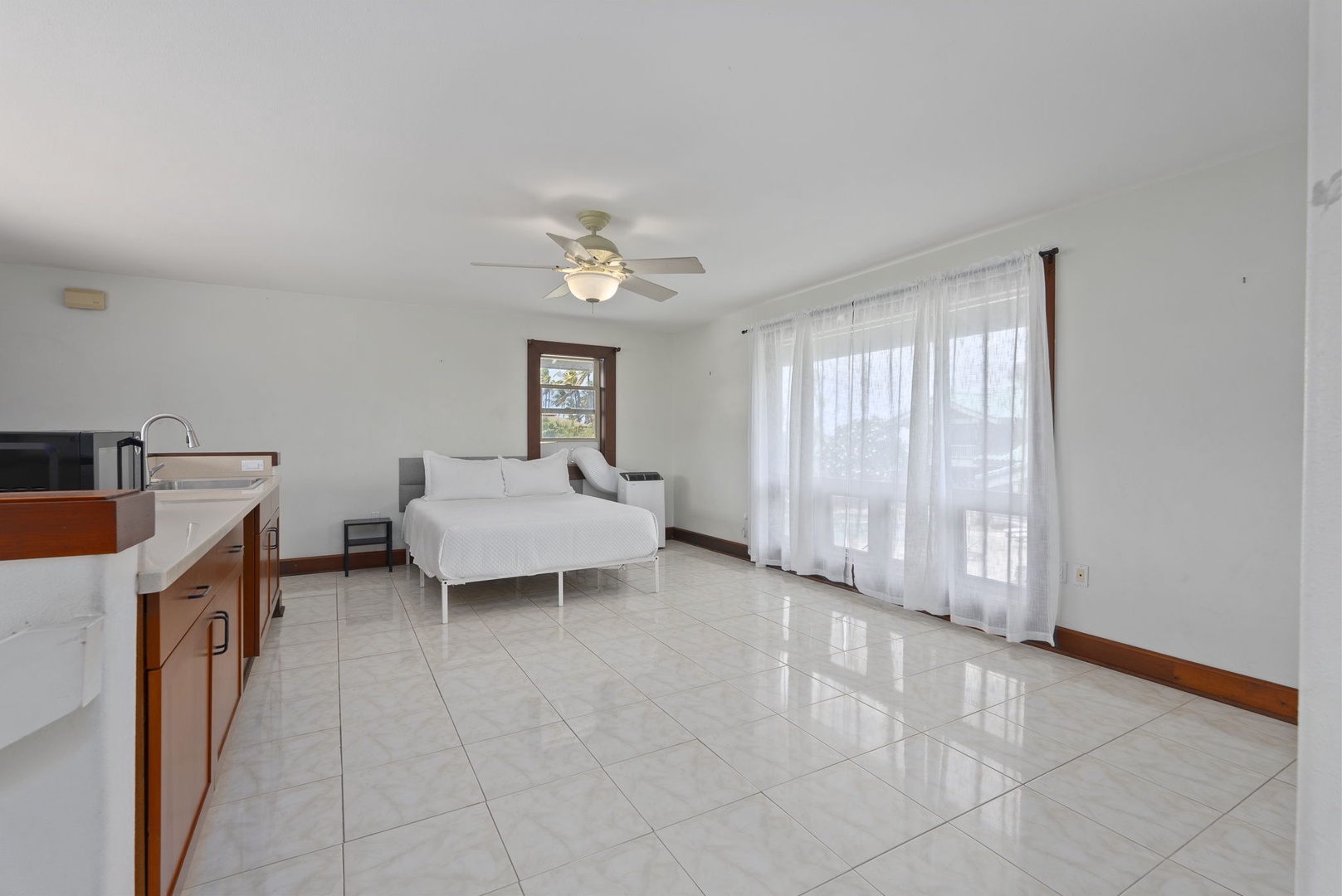 Waianae Vacation Rentals, Konishiki Beachhouse - 4BD - Bright guest suite 4 with ceiling fan and private entry.