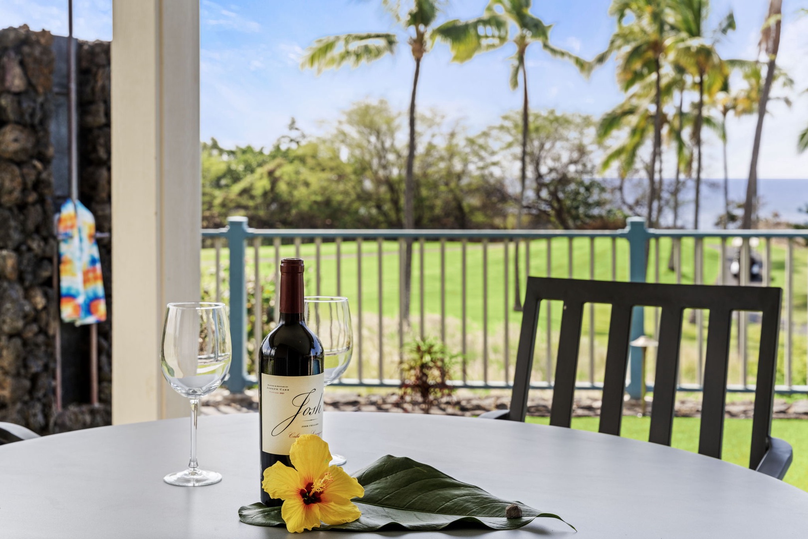 Kailua Kona Vacation Rentals, Holua Moana Hale - Dine on the lanai with a peaceful golf course view.