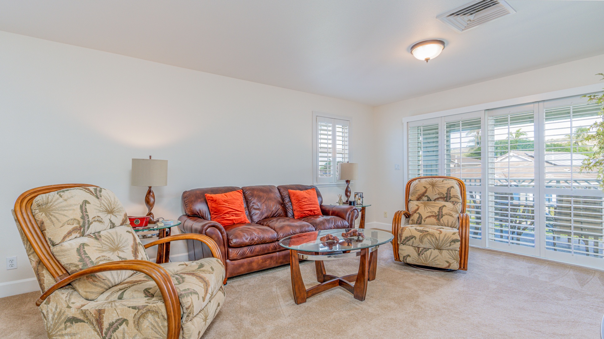 Kapolei Vacation Rentals, Ko Olina Kai 1057B - Sink in to the plush couch and curl up for movie night on the TV.