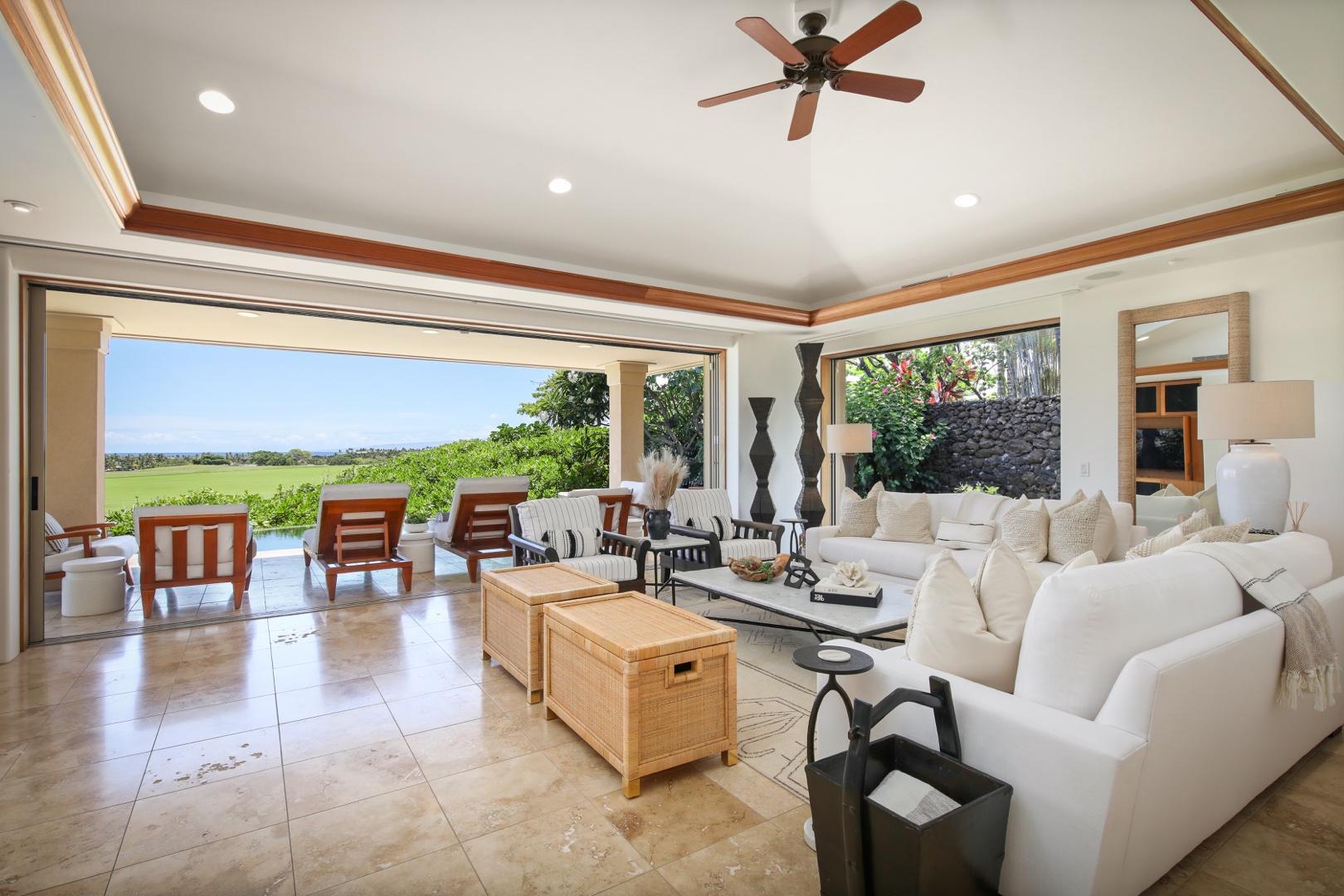 Kailua Kona Vacation Rentals, 4BD Pakui Street (147) Estate Home at Four Seasons Resort at Hualalai - Reverse view showcasing floor to ceiling sliding pocket doors to pool deck.