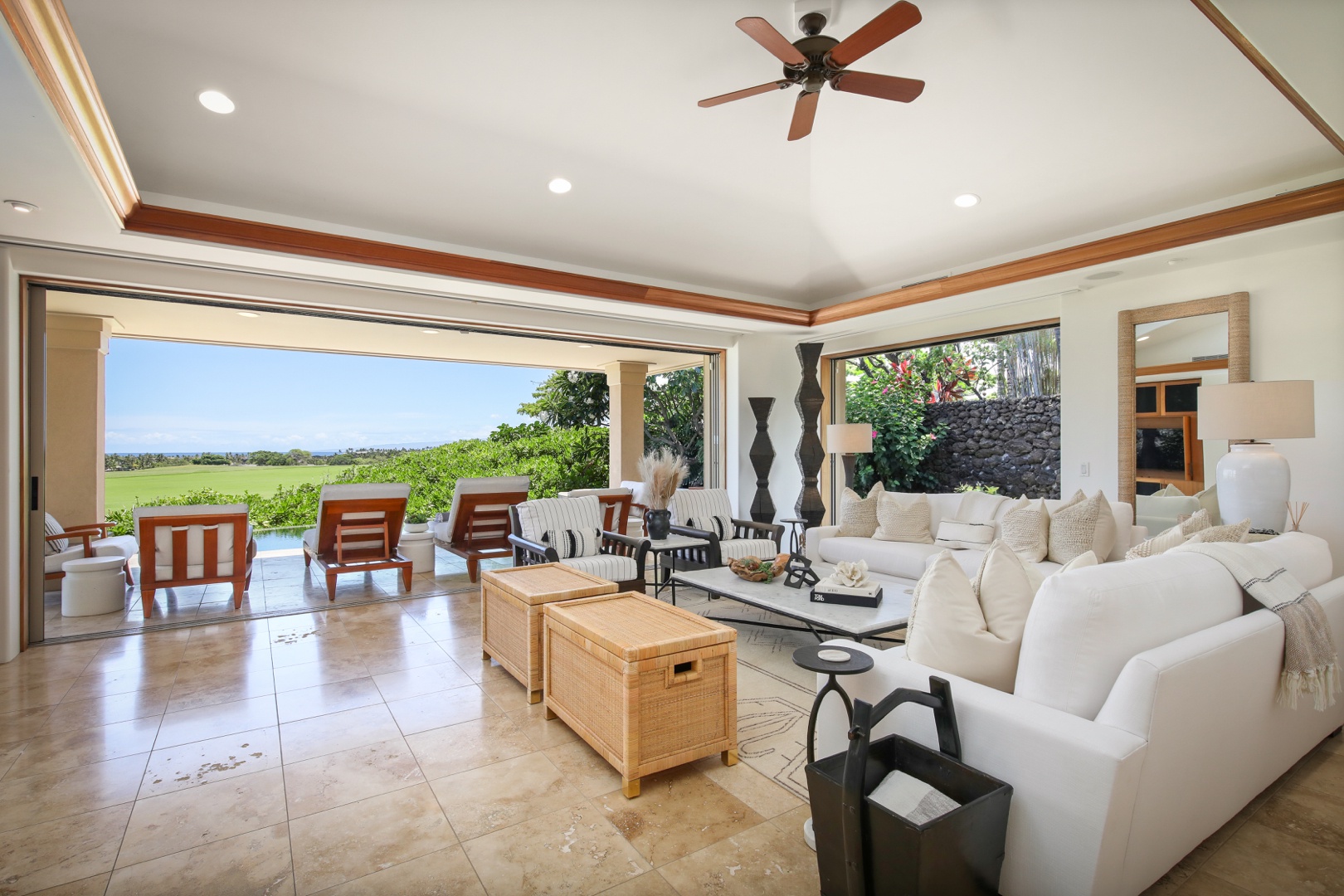 Kailua Kona Vacation Rentals, 4BD Pakui Street Estate (147) at Hualalai Resort - Reverse view showcasing floor to ceiling sliding pocket doors to pool deck.