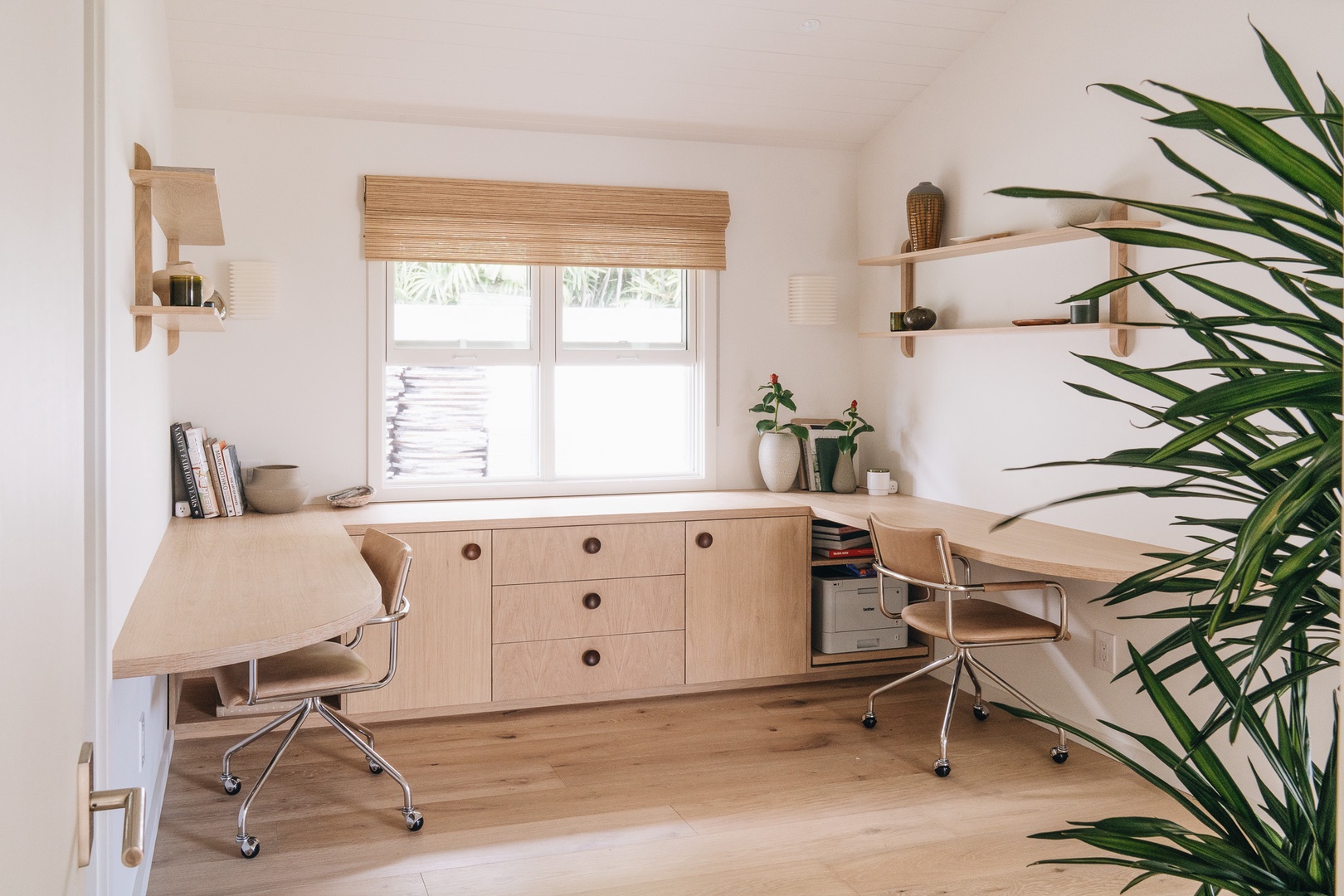 Honolulu Vacation Rentals, Surfside Bungalow** - A dedicated workspace designed for productivity and focus during extended stays.