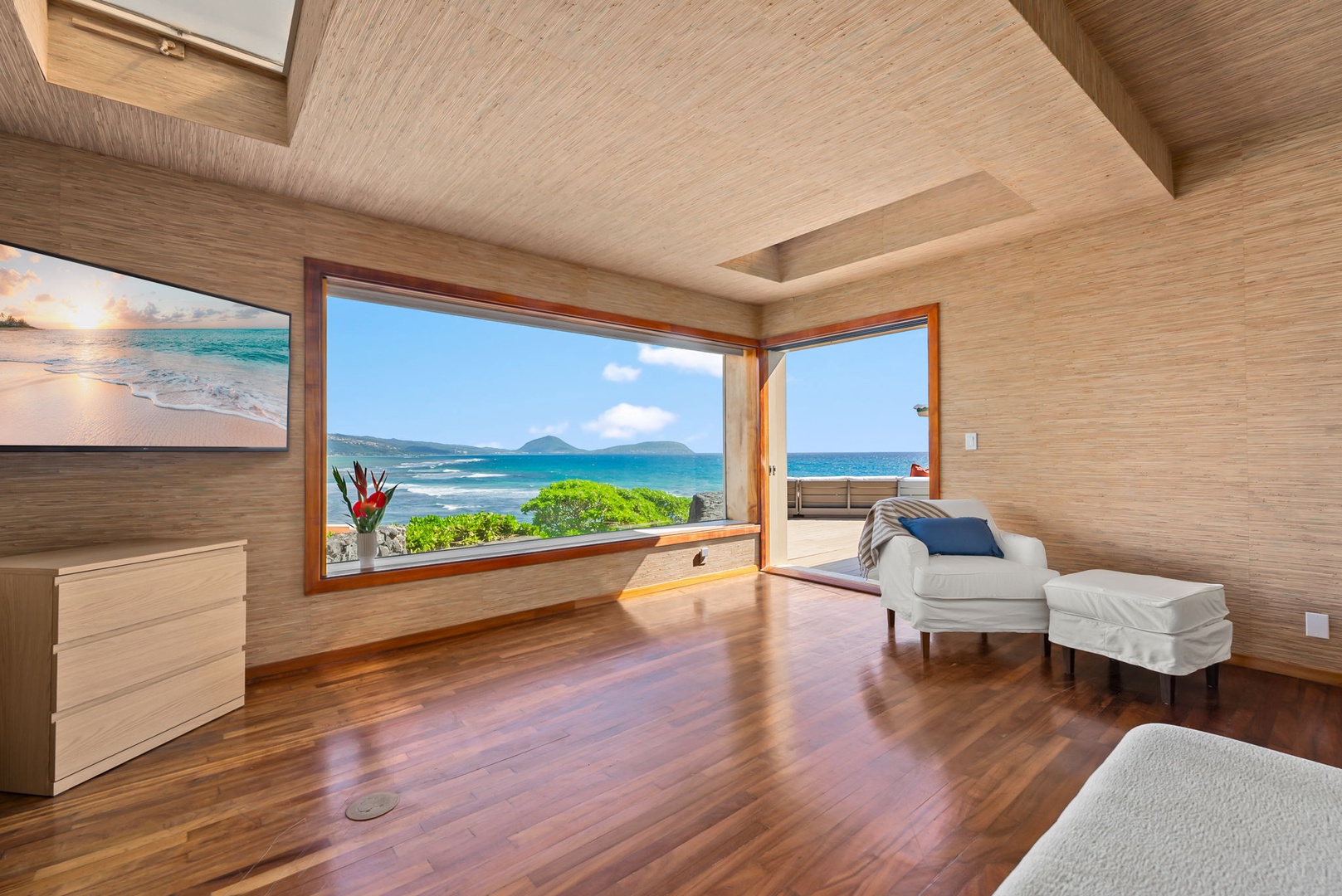 Honolulu Vacation Rentals, Black Point Ocean Villa - Breathtaking ocean views through your panoramic windows, where turquoise waters meet lush islands in perfect harmony.