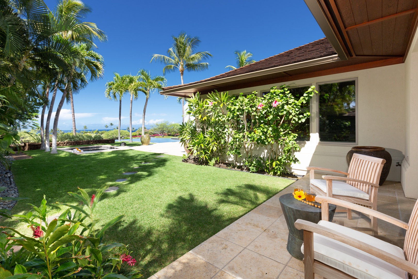 Kailua Kona Vacation Rentals, 4BD Hainoa Estate (102) at Four Seasons Resort at Hualalai - Reverse view showcasing the lanai of the second bedroom & it’s views
