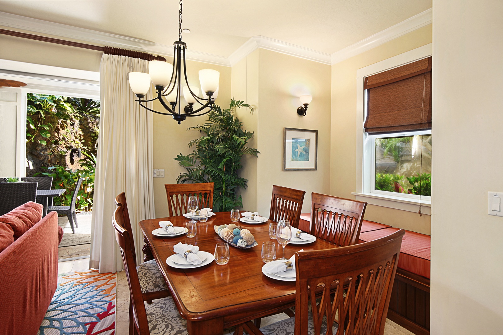 Koloa Vacation Rentals, Villas at Poipu Kai B111 - A fully appointed kitchen with fine finishes offers bar seating, with a more formal dining area for six just beyond