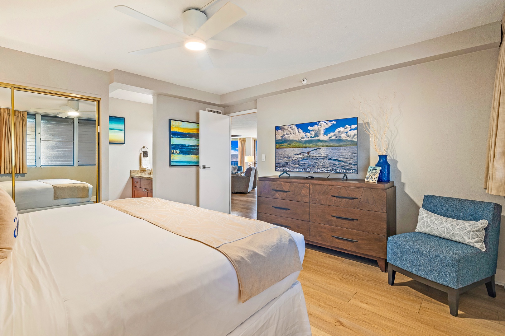 Lahaina Vacation Rentals, Royal Kahana 1010 - Unwind in Royal Kahana 1010’s guest room with king bed, dresser, and flat-screen TV.