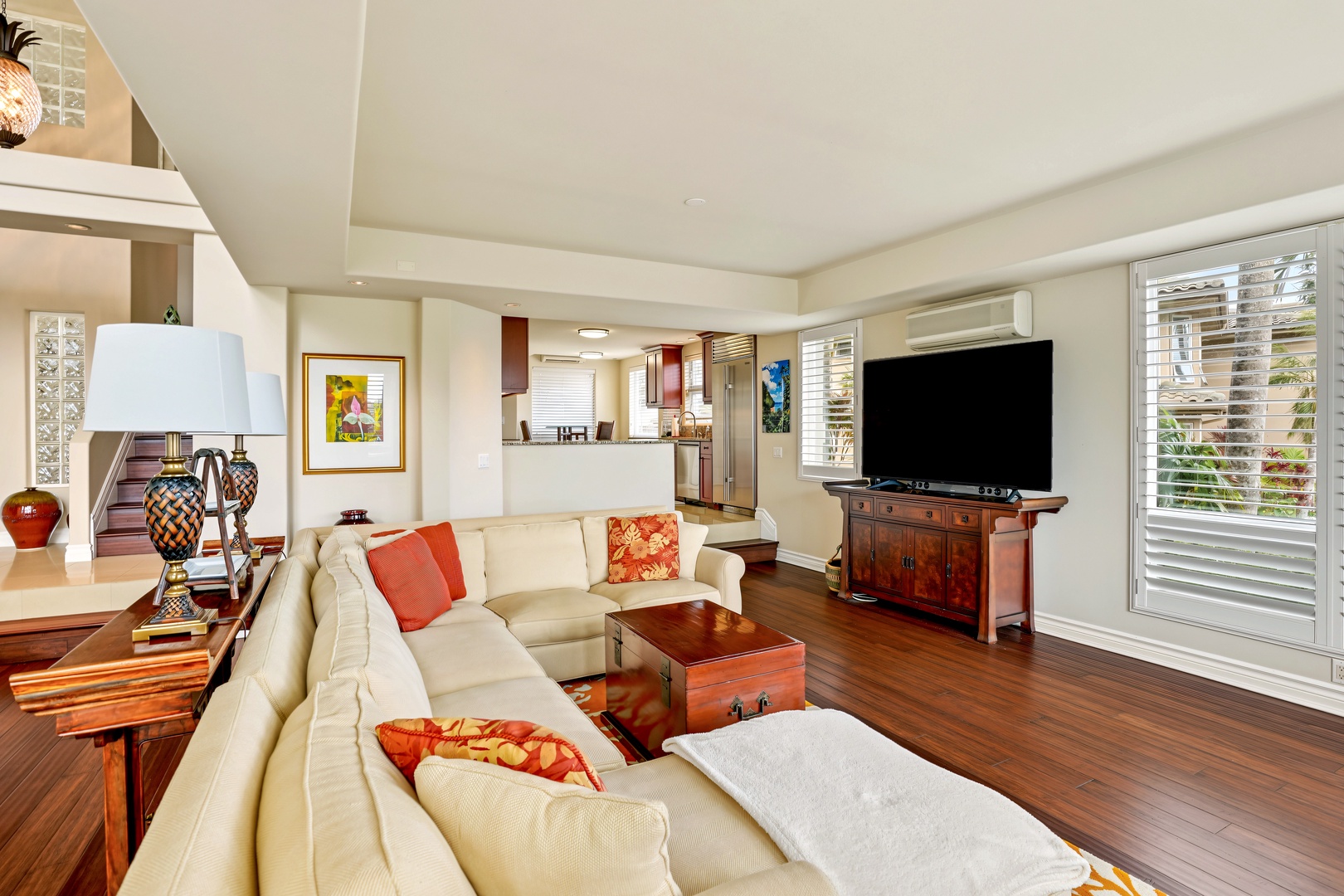 Princeville Vacation Rentals, Hale Hau'oli Moku - After the beach, there's enough sectional here for everyone to stretch out at once.