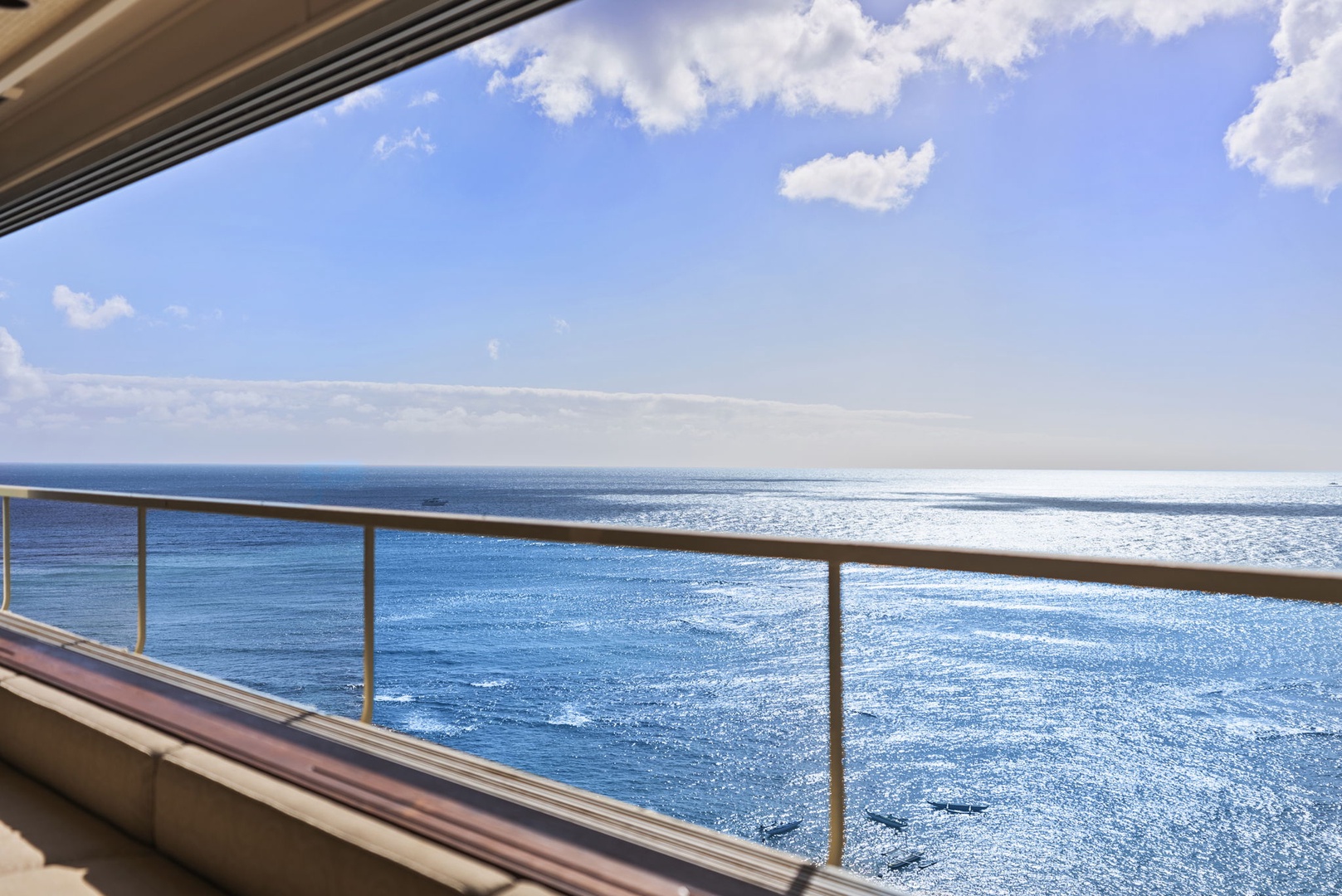 Honolulu Vacation Rentals, Hale Kaimana Breeze - Serene balcony view of the ocean creates a peaceful and relaxing atmosphere.