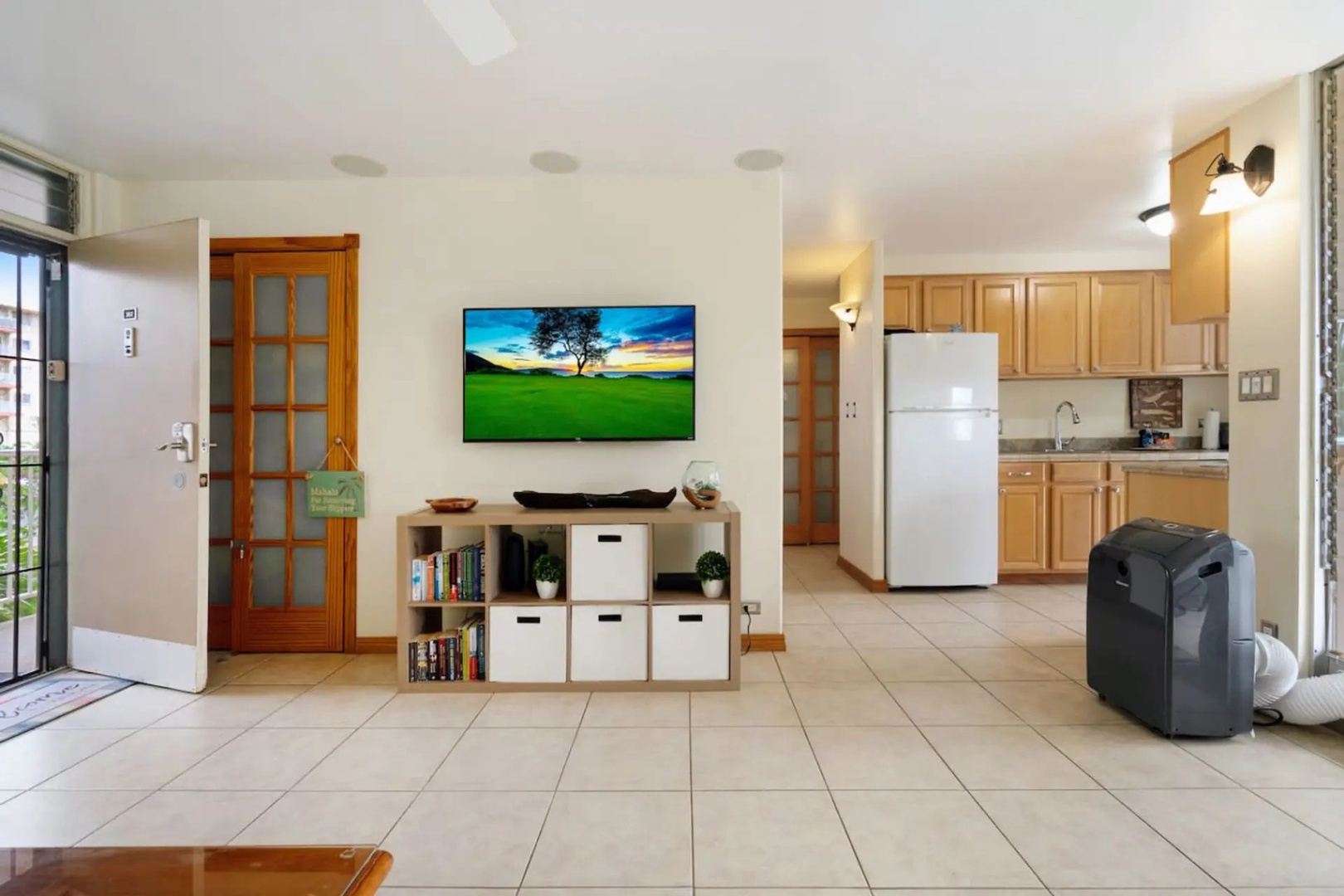 Kihei Vacation Rentals, Kalama Terrace P302 - Take the counter bar seat and the palms outside the window do the rest of the scenery.
