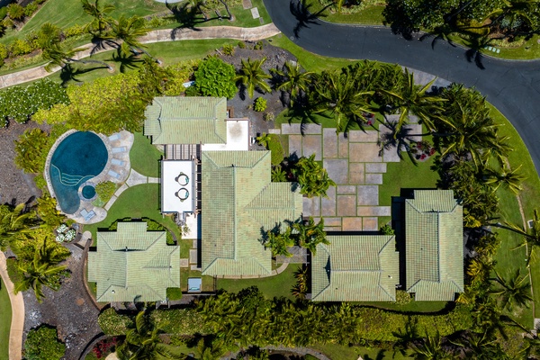 Kamuela Vacation Rentals, Canoe House & Beach Walker at Champion Ridge - Top-down view of the property layout, highlighting the spacious grounds and multiple buildings.