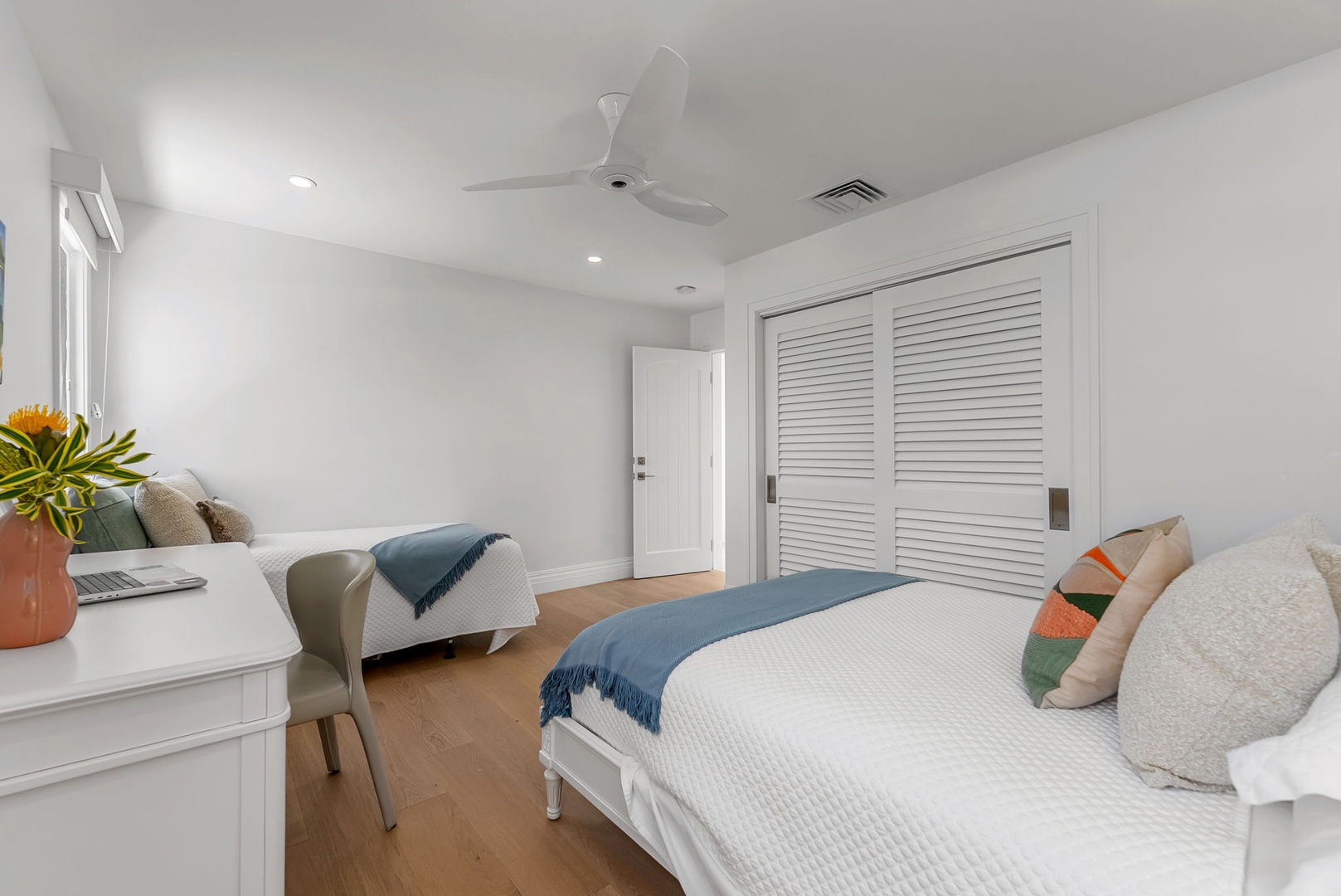 Kailua Vacation Rentals, Lanikai Sunrise Estate - Neutral tones and thoughtful design make this bedroom a quiet place to recharge, with generous storage and cool comfort.