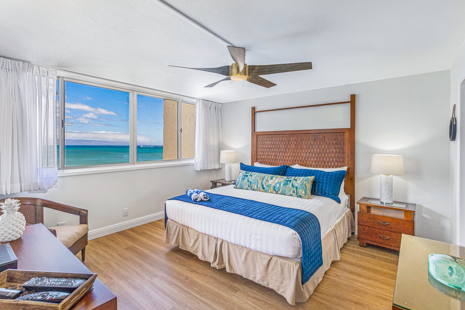 Lahaina Vacation Rentals, Royal Kahana 213 - The spacious primary bedroom at Royal Kahana 213 features ocean views and a plush king bed for restful nights.
