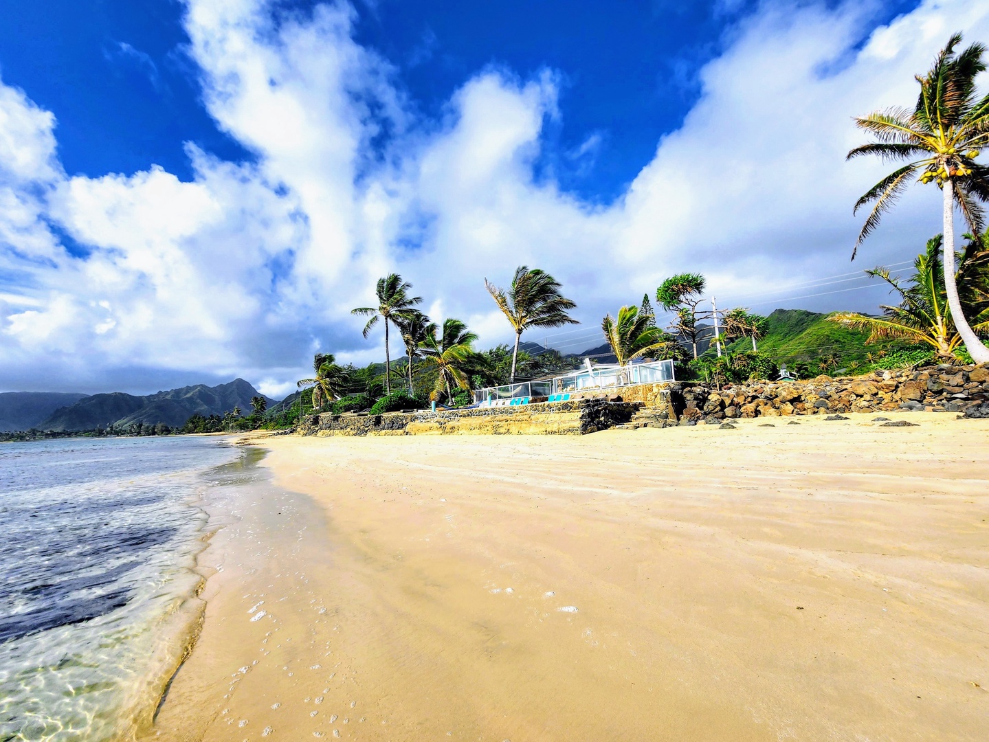 Hauula Vacation Rentals, Private Beach Paradise - Stroll along a wide, sandy beach perfect for morning walks, beachcombing, and soaking in the relaxed rhythm of oceanfront living.