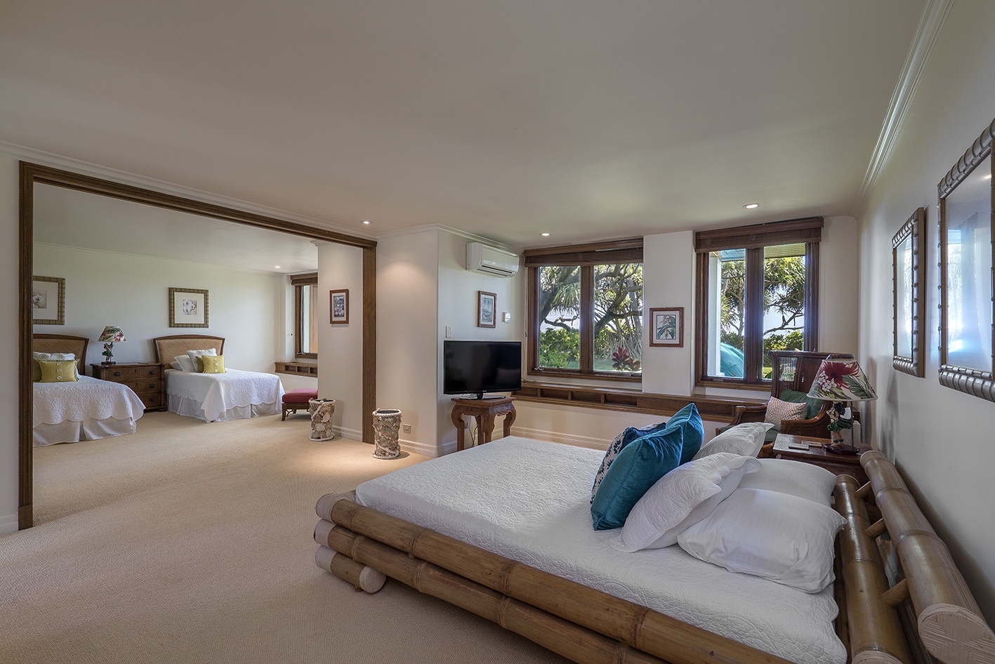 Kailua Vacation Rentals, Kailua's Kai Moena - "Guest house: Guest Bedroom 1 with split A/C located second bedroom down the hallway. Full Bed.  Conjoined with Guest Bedroom 2, but can be closed off from each other."