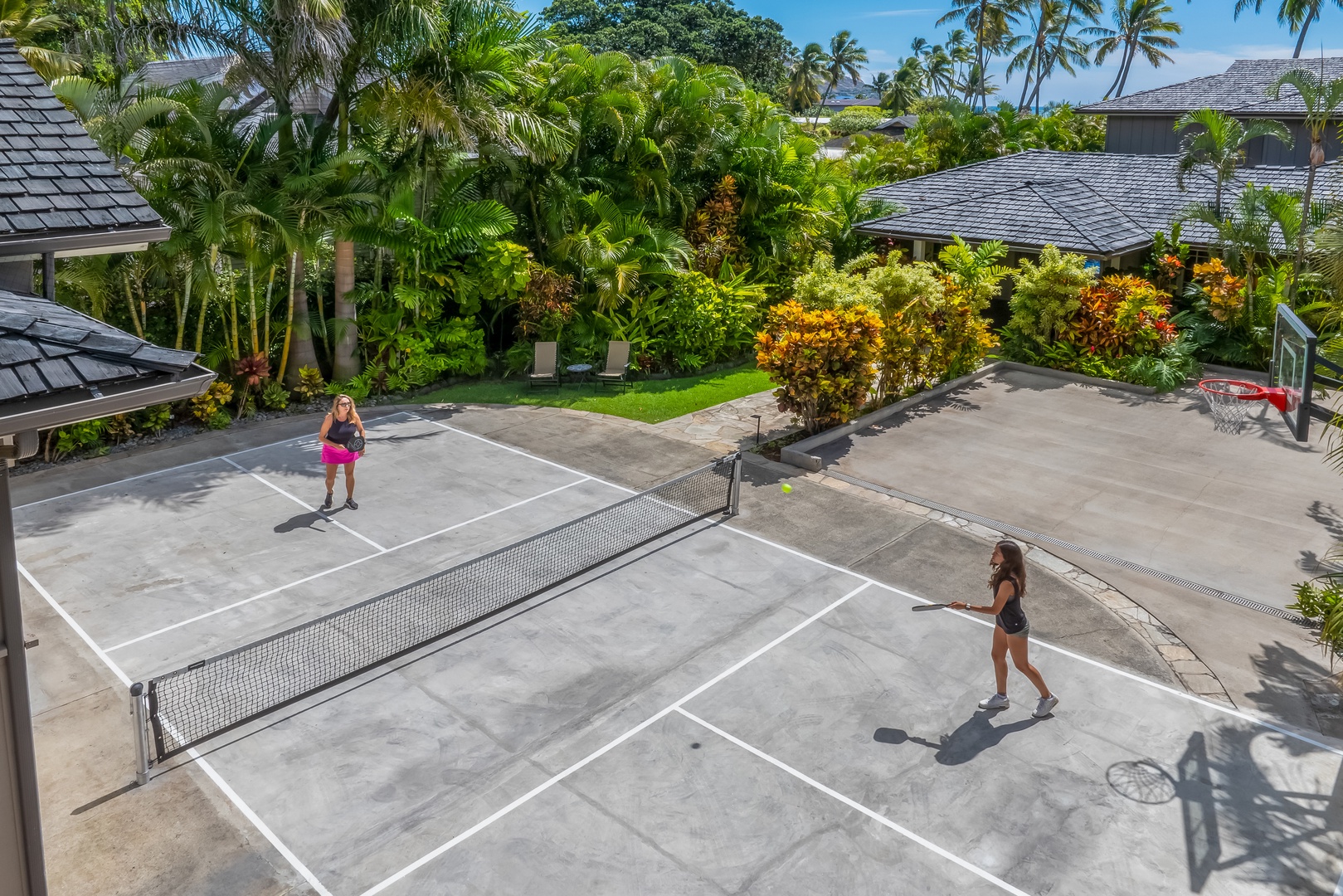 Honolulu Vacation Rentals, Moana Lani - Sunny pickleball matches on the private court.