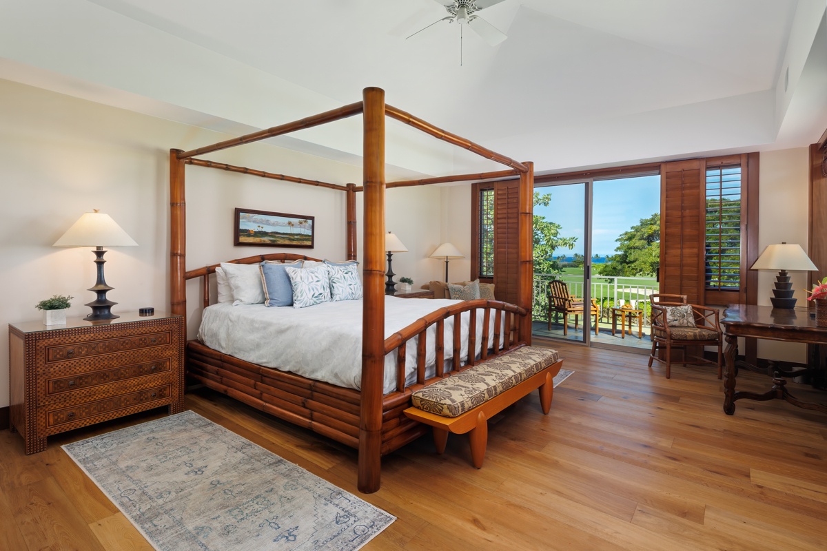 Kailua Kona Vacation Rentals, Fairways Villa 120A - Unwind in your tropical sanctuary with elegant four-poster bed, rich wood details, and private balcony overlooking lush gardens.