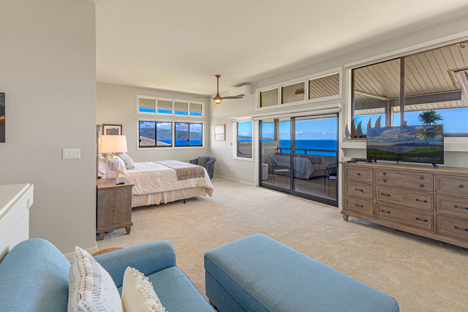 Lahaina Vacation Rentals, Kapalua Ridge 1622 - This spacious primary suite offers a serene retreat with a king-sized bed, brand new carpet, large windows, and direct lanai access that showcases expansive ocean views. Perfect for unwinding while taking in the stunning surroundings.