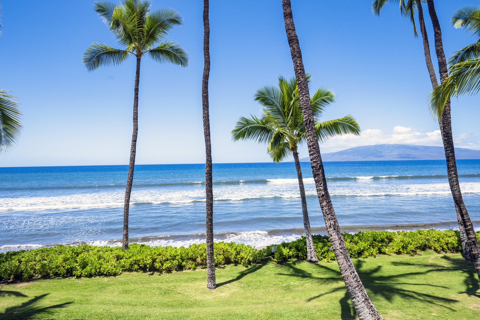 Lahaina Vacation Rentals, Puamana 240-3 - Stroll along the lush green lawns with uninterrupted ocean views.