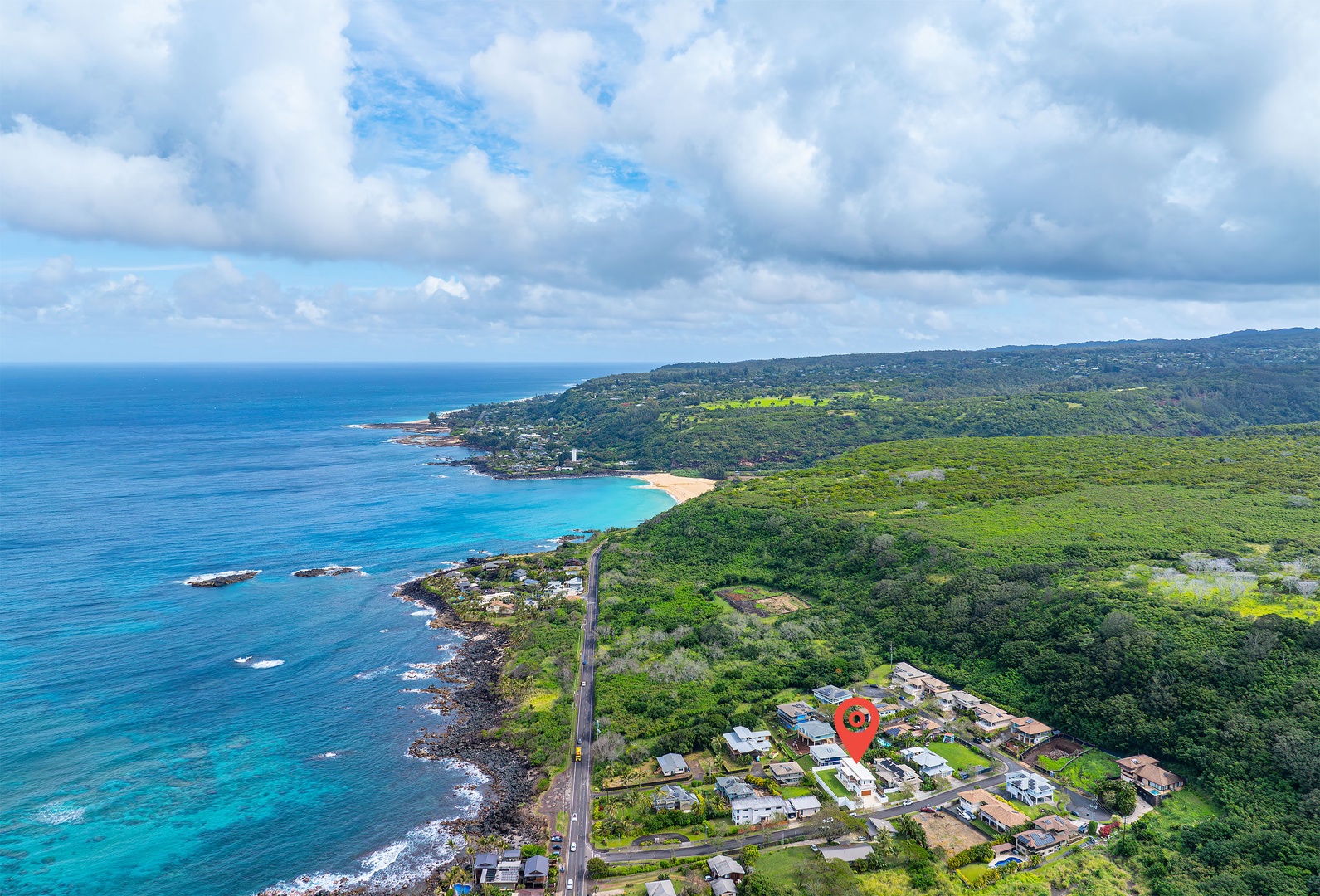 Haleiwa Vacation Rentals, Villa Bianca - Aerial shot of the community, highlighting the stunning coastal surroundings.