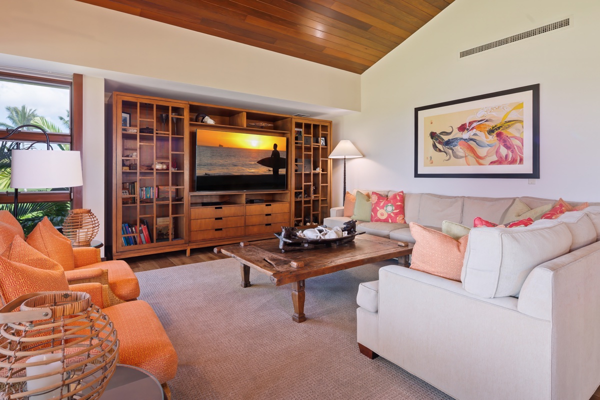 Kailua Kona Vacation Rentals, Fairways Villa 120A - Unwind in your spacious living area with plush seating, entertainment center, and warm tropical touches throughout.