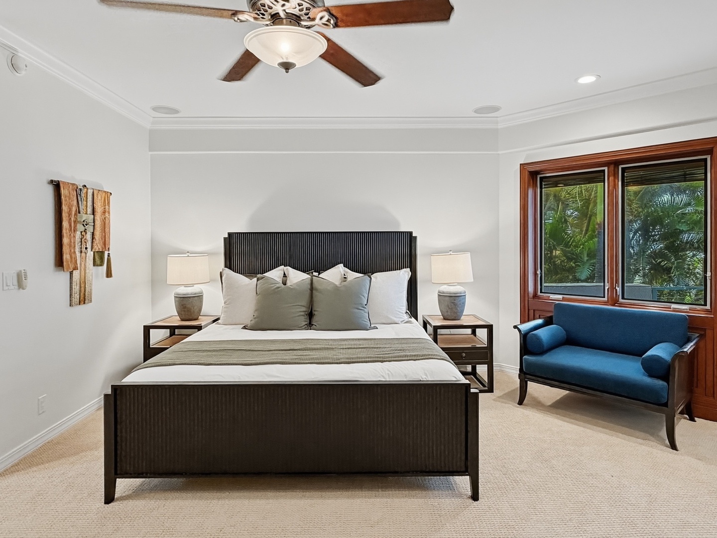 Honolulu Vacation Rentals, Maunalua Estate - Your peaceful bedroom retreat features crisp linens and tropical garden views through the window, creating a serene escape.