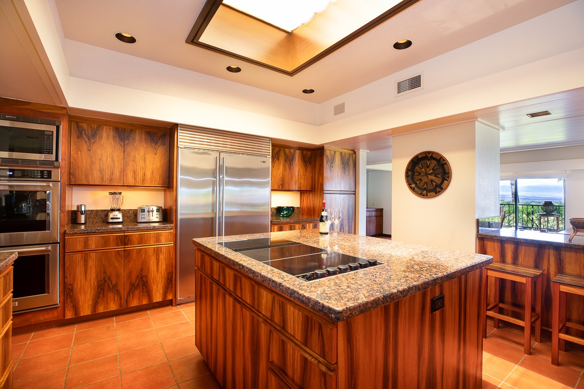 Kamuela Vacation Rentals, Mauna Kea Villas #13 - Fully equipped gourmet kitchen with high-end finishes and modern appliances, ideal for effortless island-style meals.