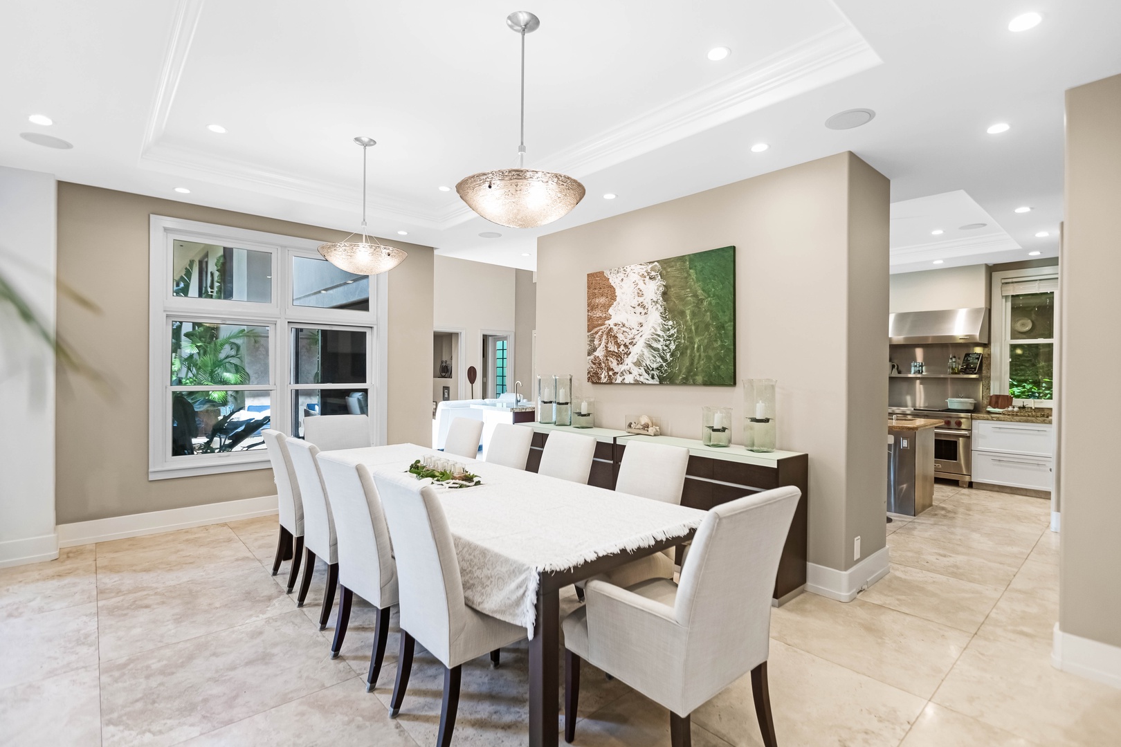 Honolulu Vacation Rentals, Pili Pono - Formal dining for ten with soft lighting and views of the lush grounds.